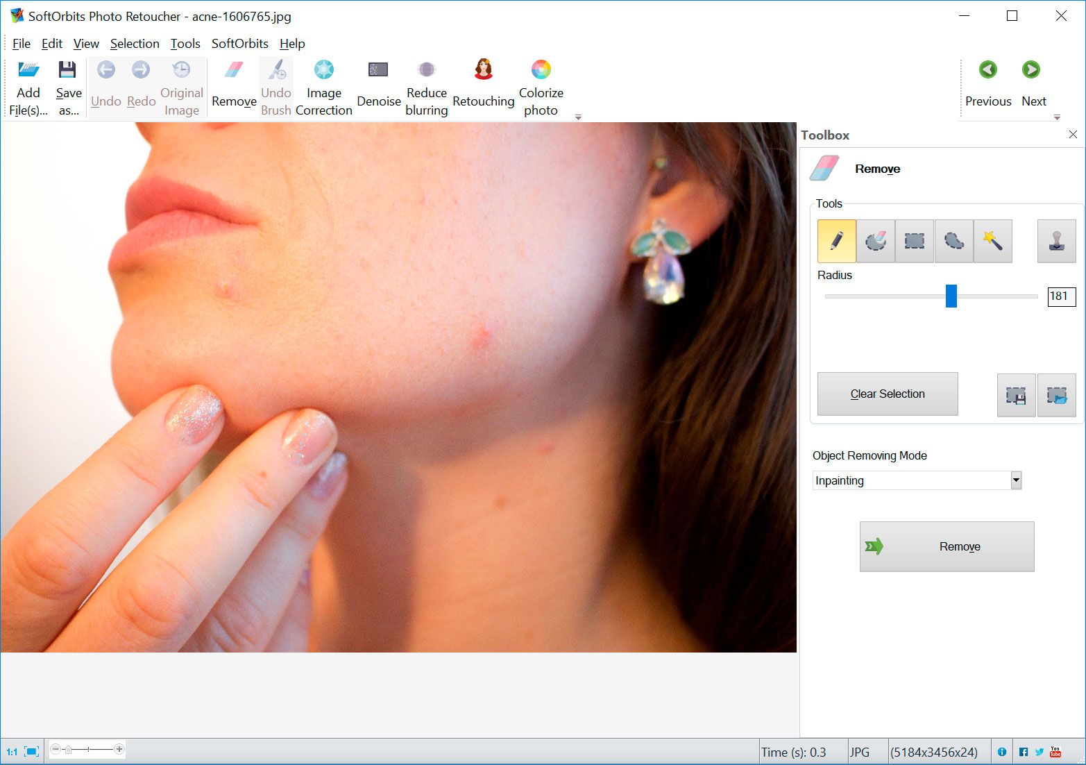 Marker tool to remove blemish from girl face..