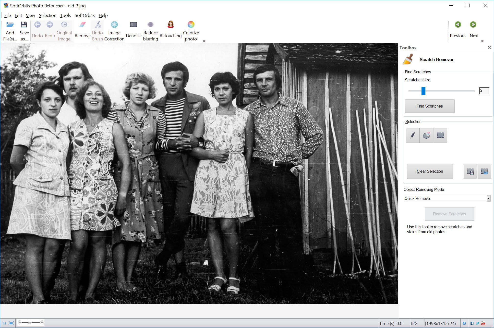 Remove scratches from old photo.